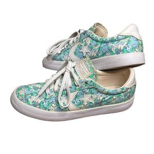 Women’s converse all star low top lace up floral multi color size 6 sneakers.